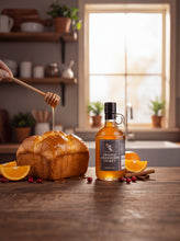 Load image into Gallery viewer, Firebee Orange Cranberry Honey with honey-glazed bread, oranges and cranberries