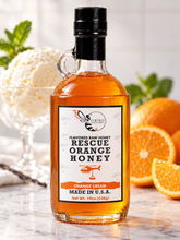 Load image into Gallery viewer, Firebee Rescue Orange Honey — 19oz glass, styled