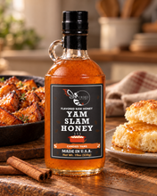 Load image into Gallery viewer, Firebee Yam Slam Honey 19oz glass bottle on a farmhouse table